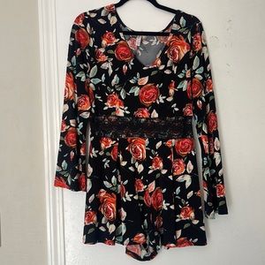 XL floral xhilaration romper. Worn a few times on special occasions